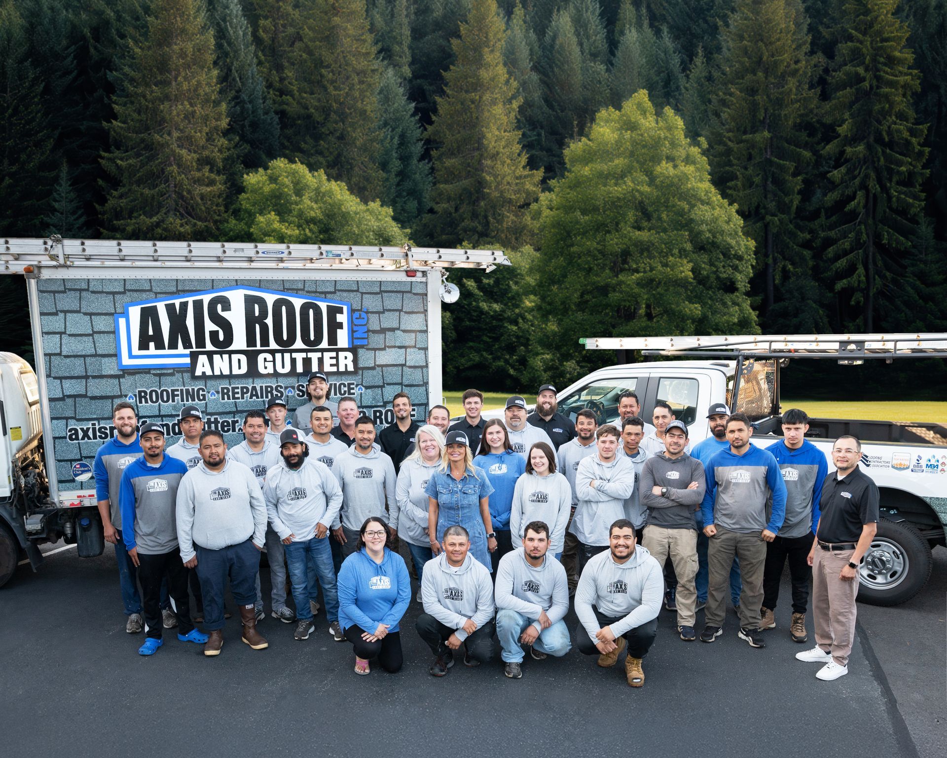 Axis Roof and Gutter team standing together