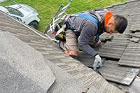 Shingles being installed