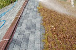 power washing on a roof
