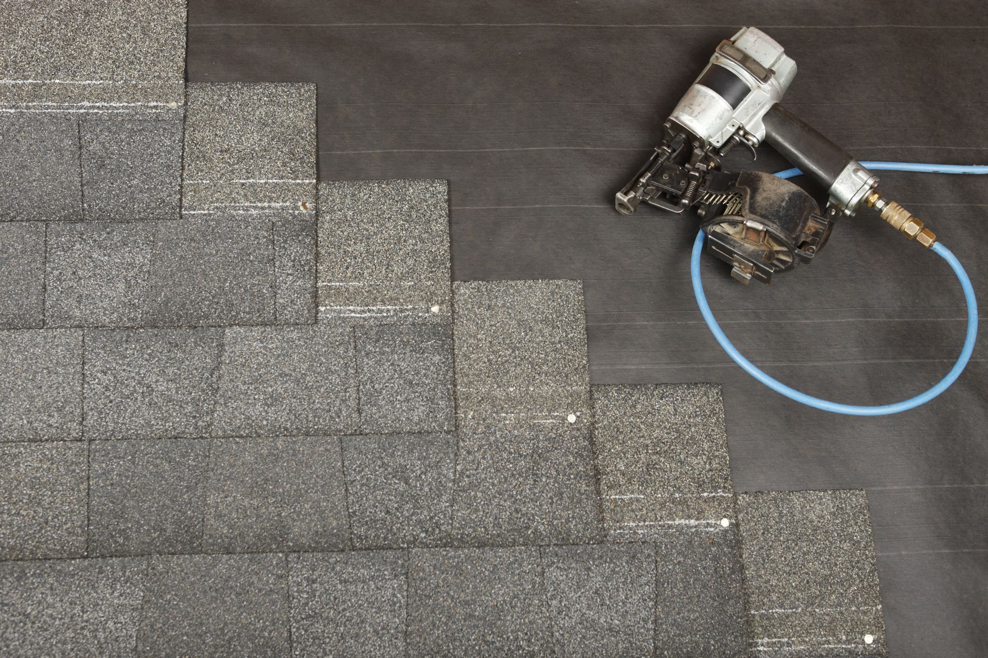 shingles being installed on a roof