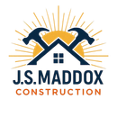Logo for J.S. Maddox Construction featuring two crossed hammers and a house outline in dark blue over a gold sunburst.