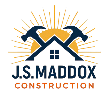 Logo for J.S. Maddox Construction featuring two crossed hammers and a roof silhouette against a yellow sunburst.