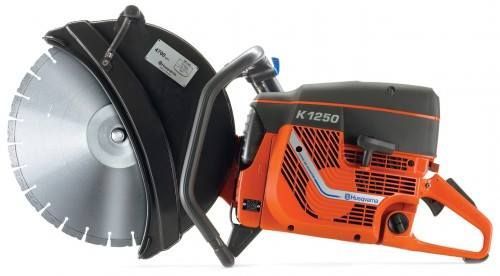 Orange and Black Husqvarna K1250 Concrete Saw With Large Silver Blade — Coastcut Concrete Cutting Pty Ltd in Corlette, NSW