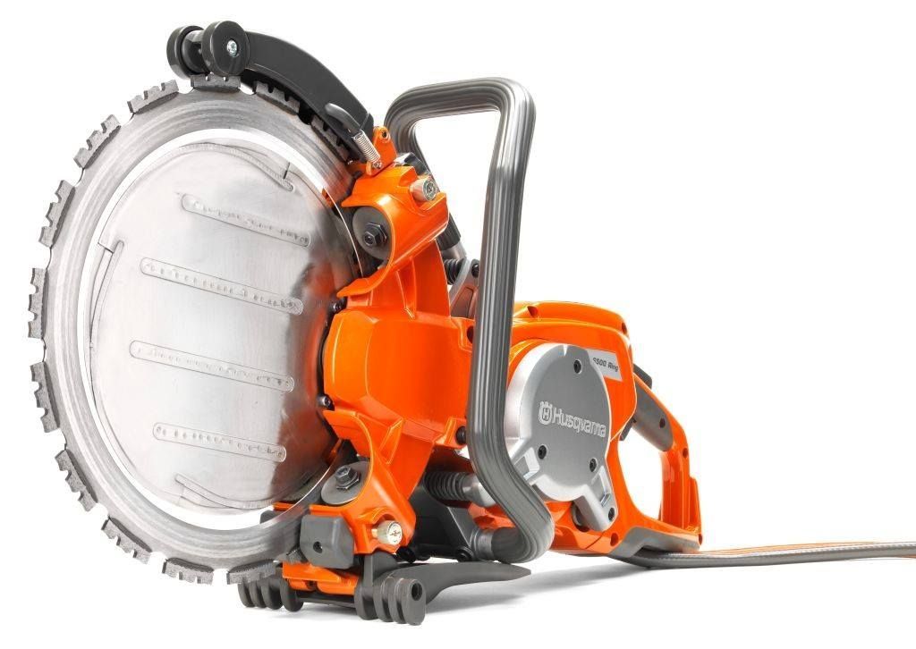 Orange Husqvarna Electric Concrete Saw With Silver Blade — Coastcut Concrete Cutting Pty Ltd in Corlette, NSW