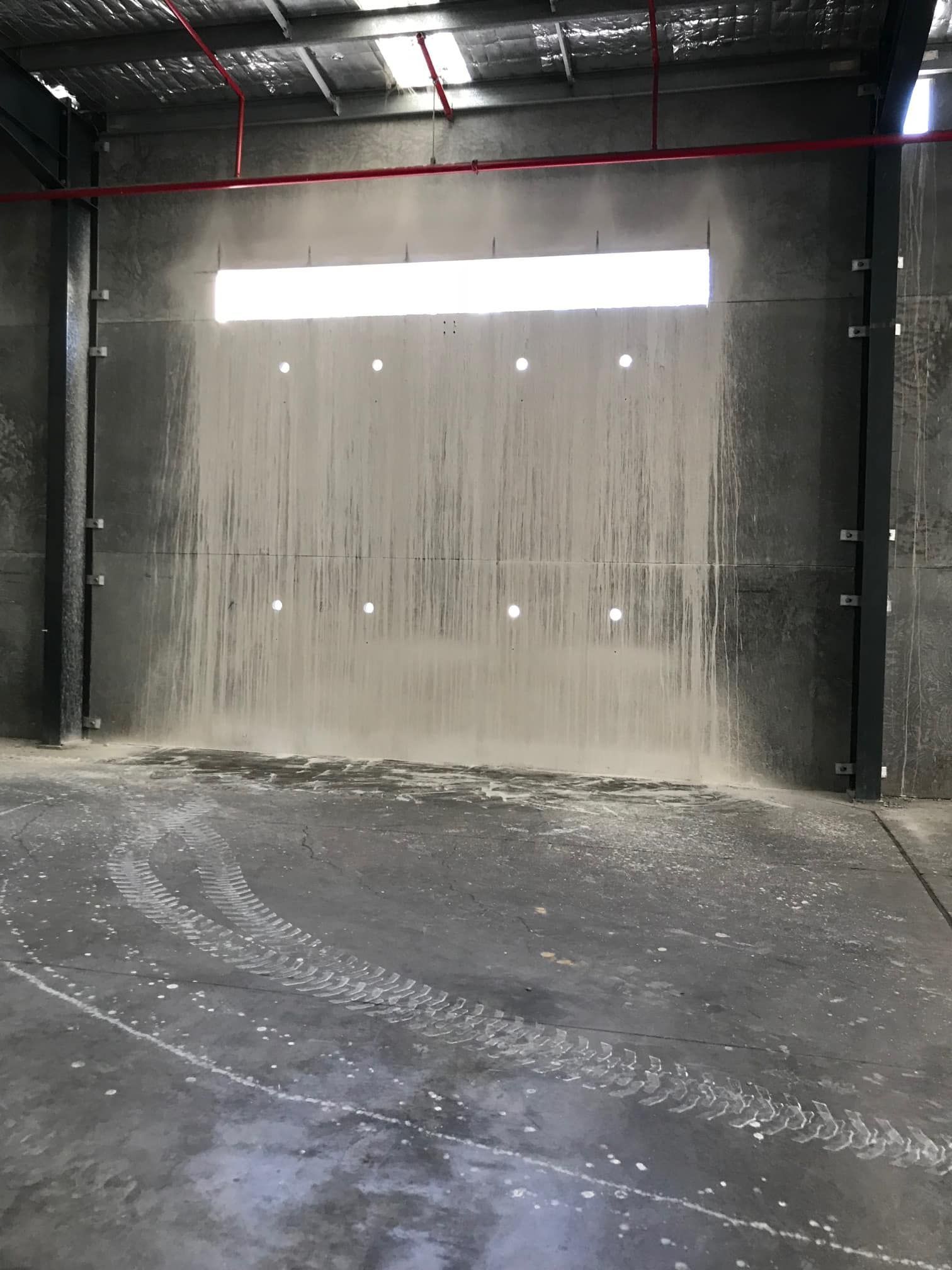 Dust-covered Wall in a Concrete Warehouse — Coastcut Concrete Cutting Pty Ltd in Newcastle, NSW