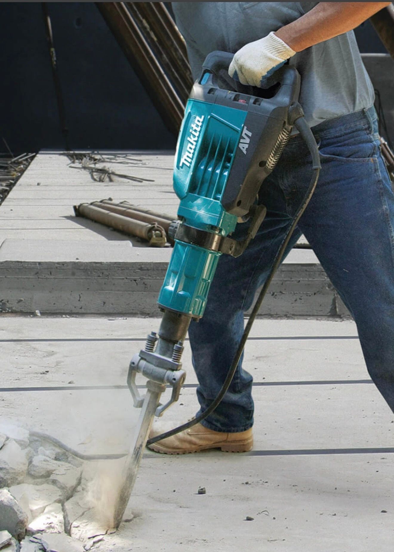 Worker Using a Core Drill to Bore a Hole Into a Concrete Wall  — Coastcut Concrete Cutting Pty Ltd in Corlette, NSW