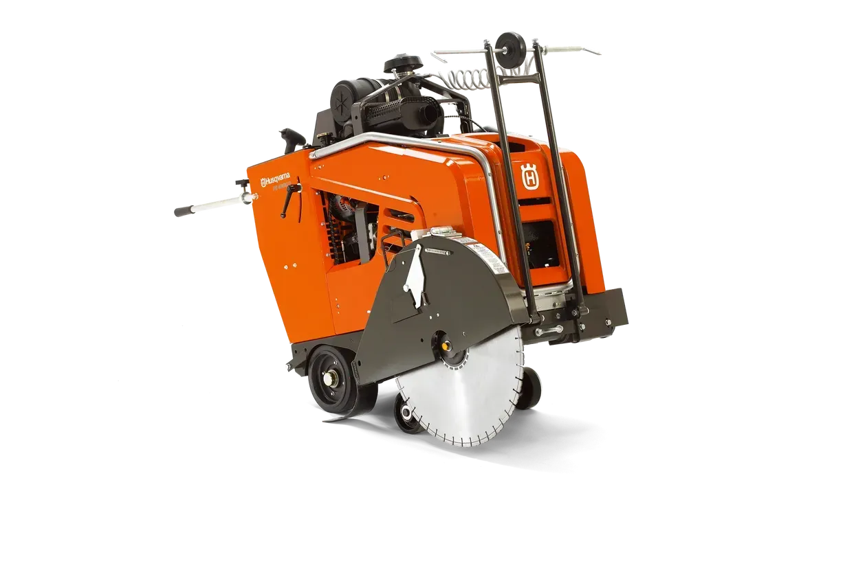 Orange concrete saw with large circular blade on a white background