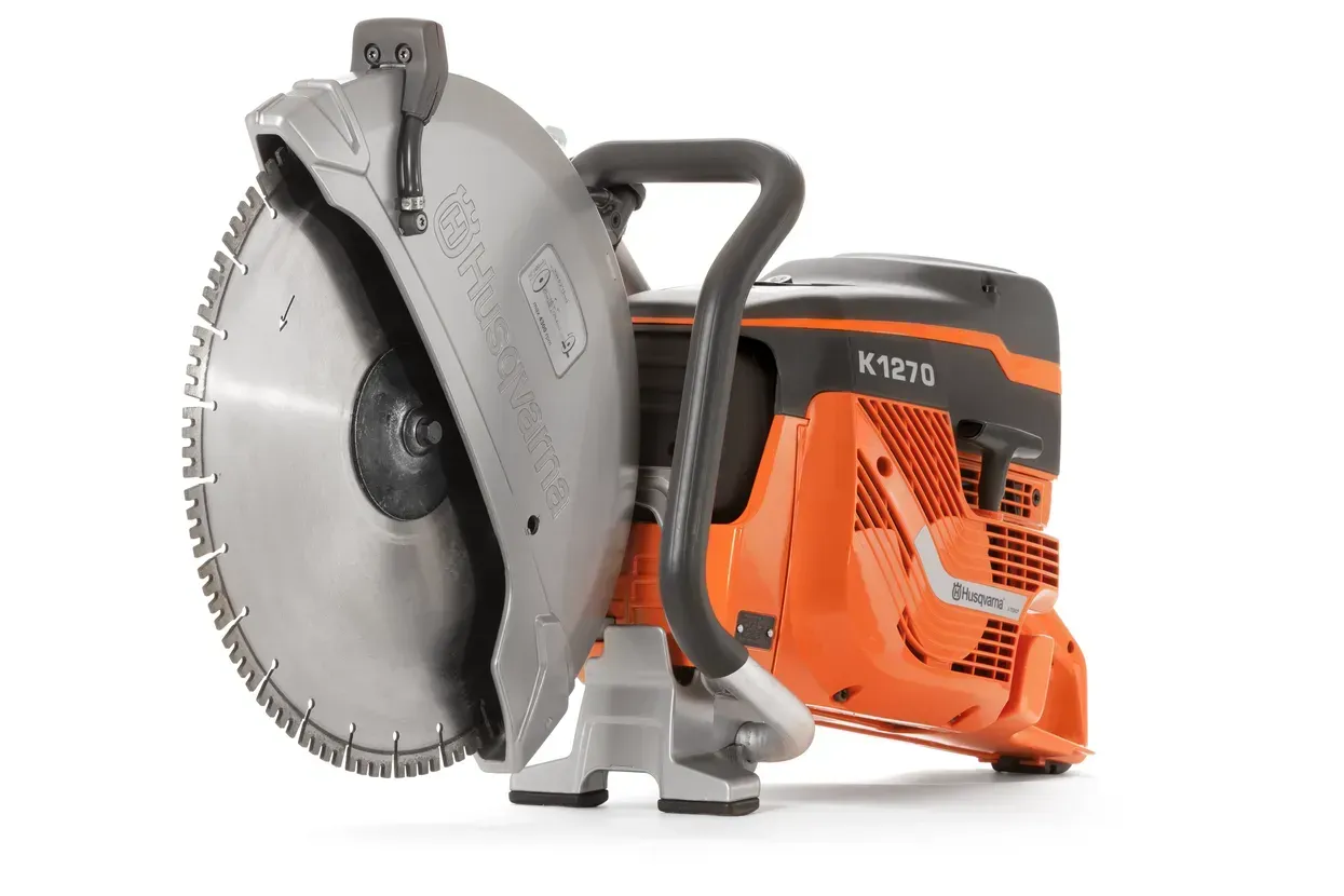 Orange and gray gasoline-powered cutoff saw with a large circular blade and handle handle