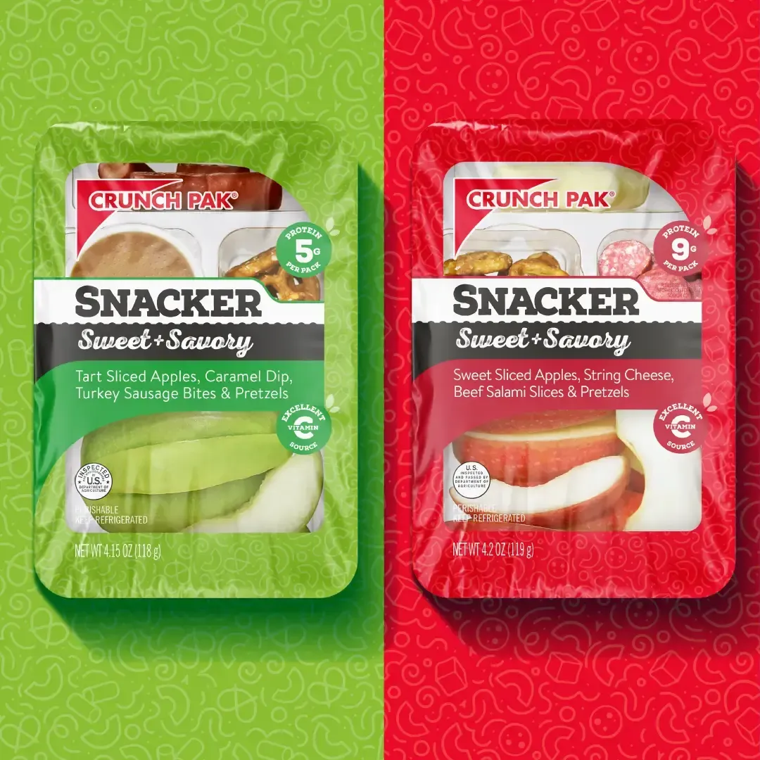 Two trays of Snacker Sweet and Savory on a green and red background