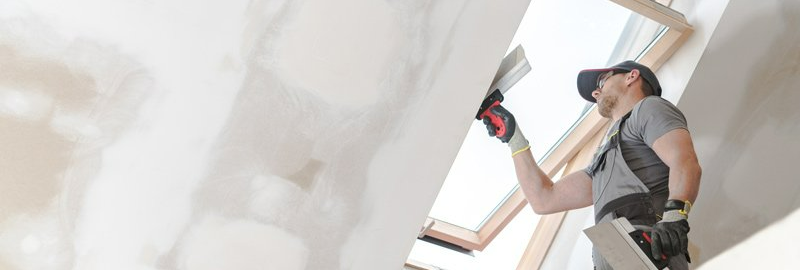 contractor working on sky light
