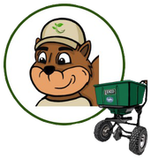 GreenerConcepts Mascot with green fertilizer spreader.