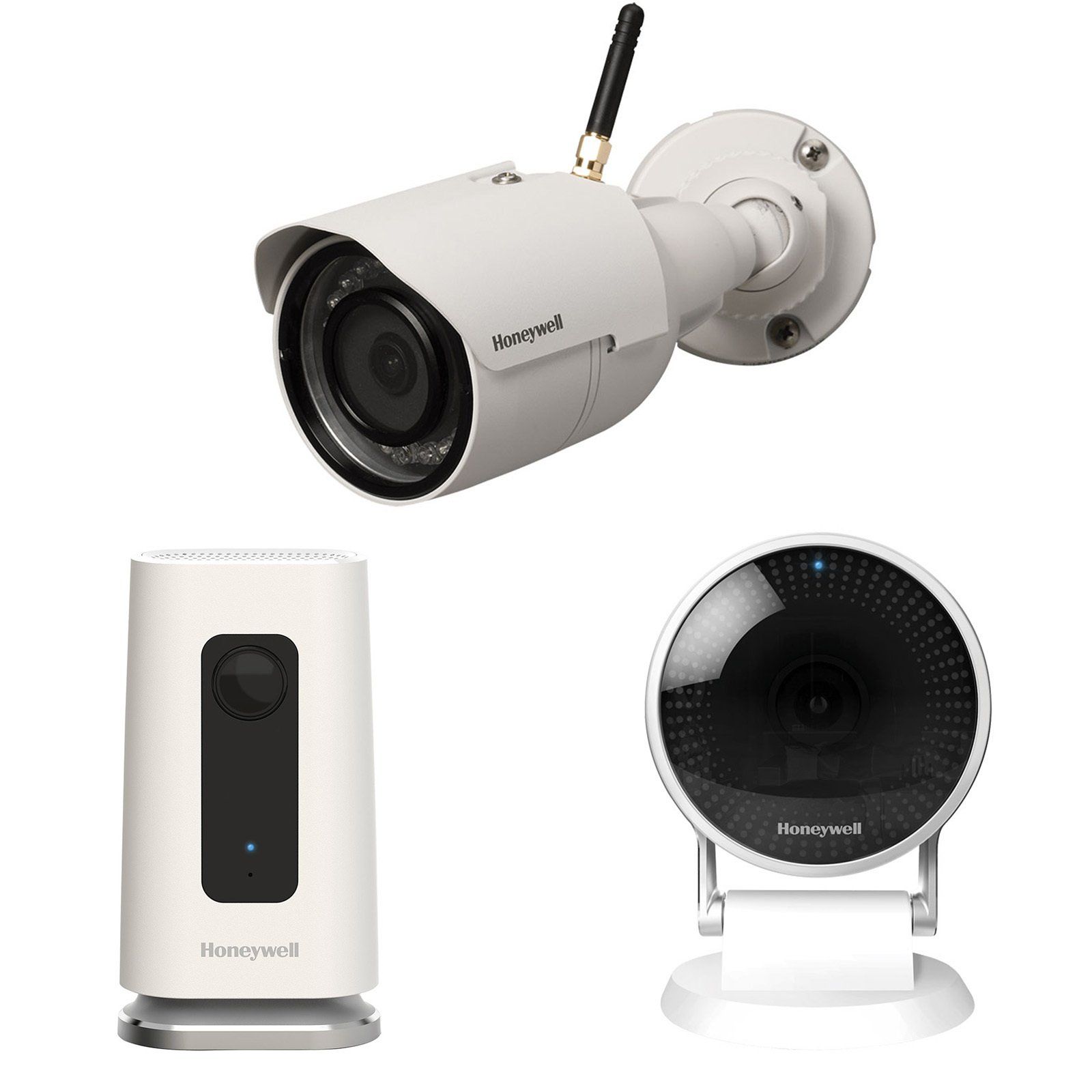 Three security cameras are sitting next to each other on a white background.