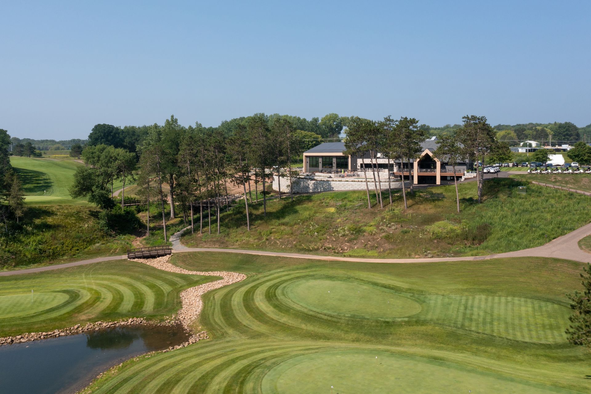 View of the backside of the patio and putting practice.