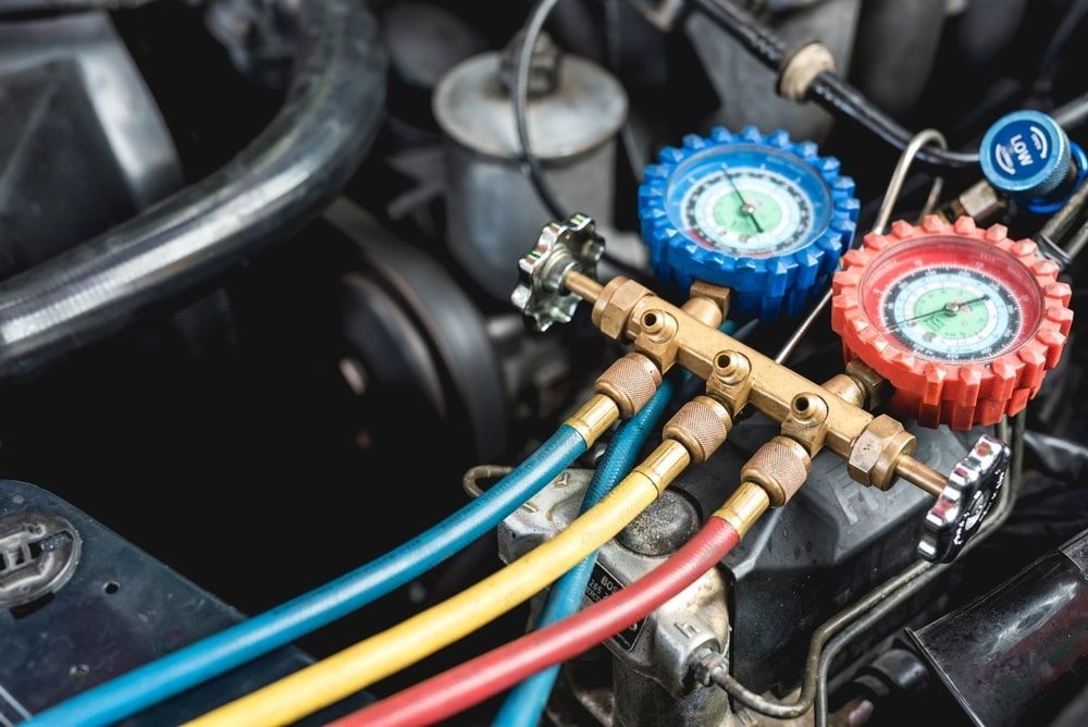 A Close Up Of A Car Engine With Hose And Gauges — P & M Performance & Mechanical In Bungalow, QLD