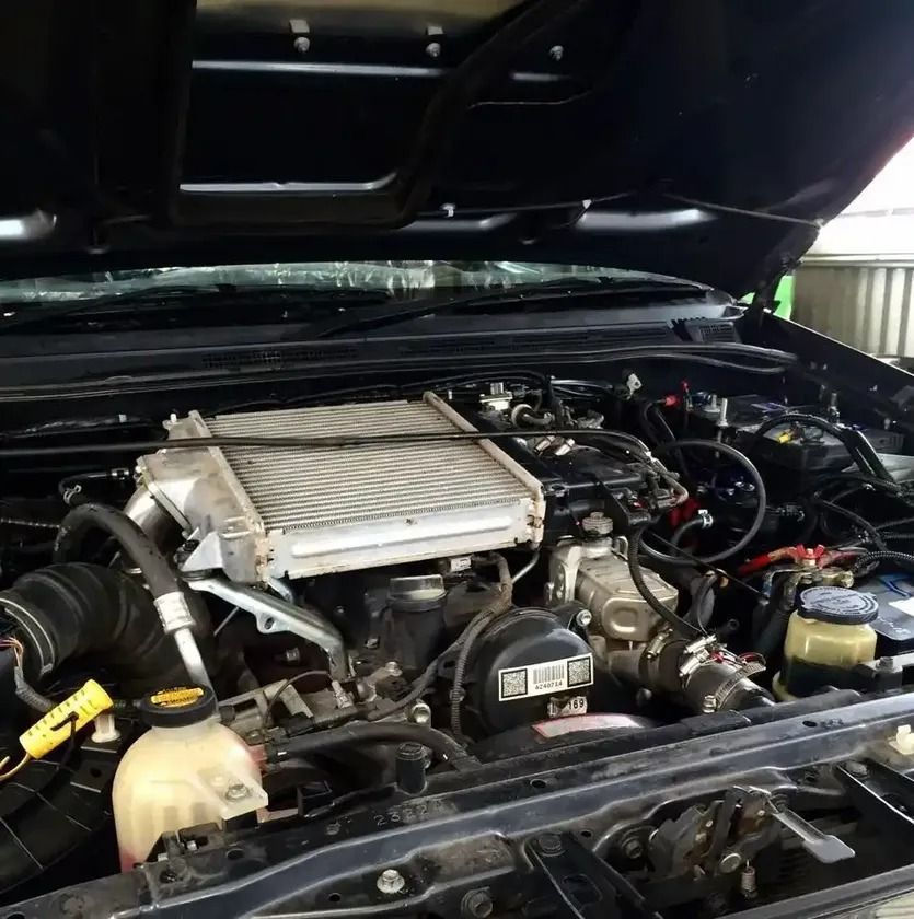 The Engine Of A Car With The Hood Open — P & M Performance & Mechanical In Bungalow, QLD