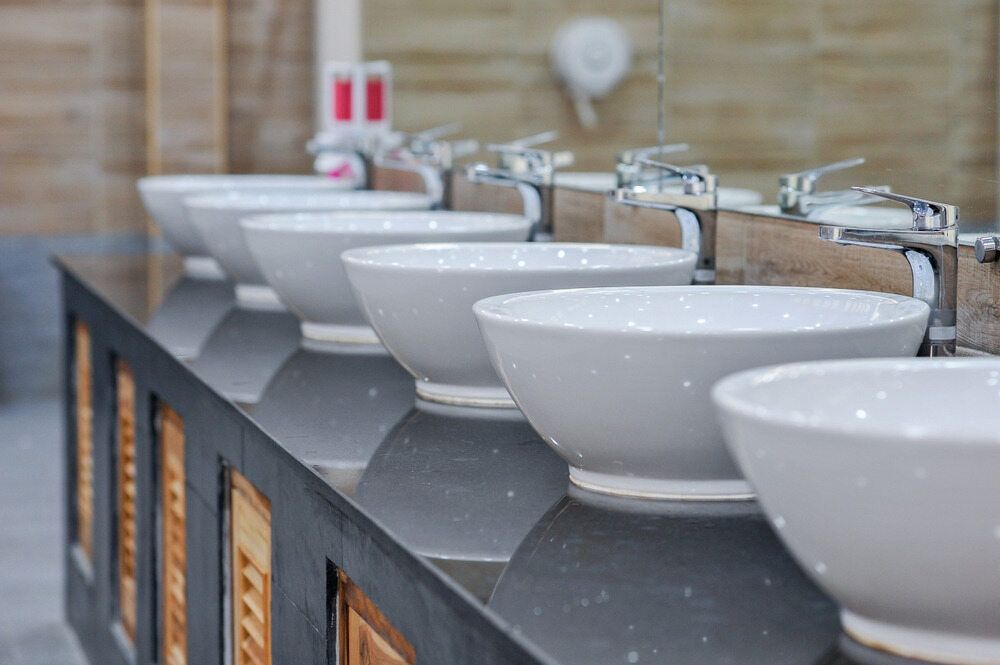 A Row of Bathroom Basins — Justin Drew Plumbing in Grovedale, VIC