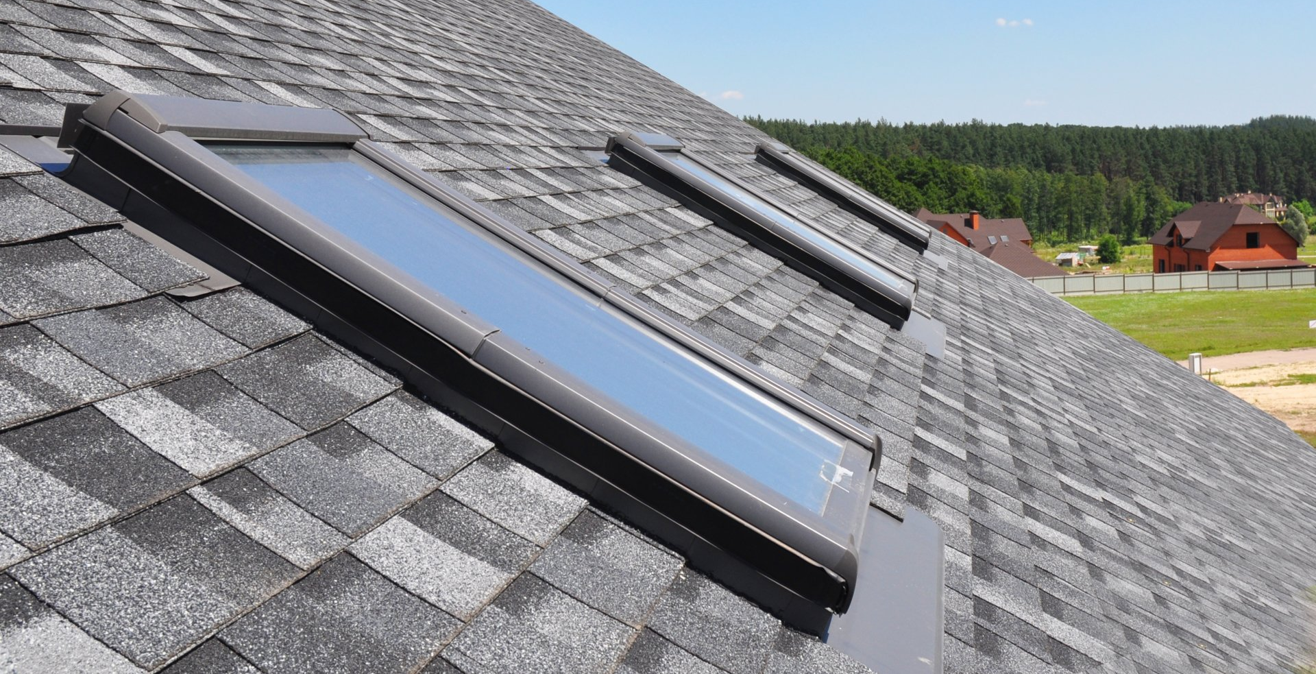a roof with a few skylights on it