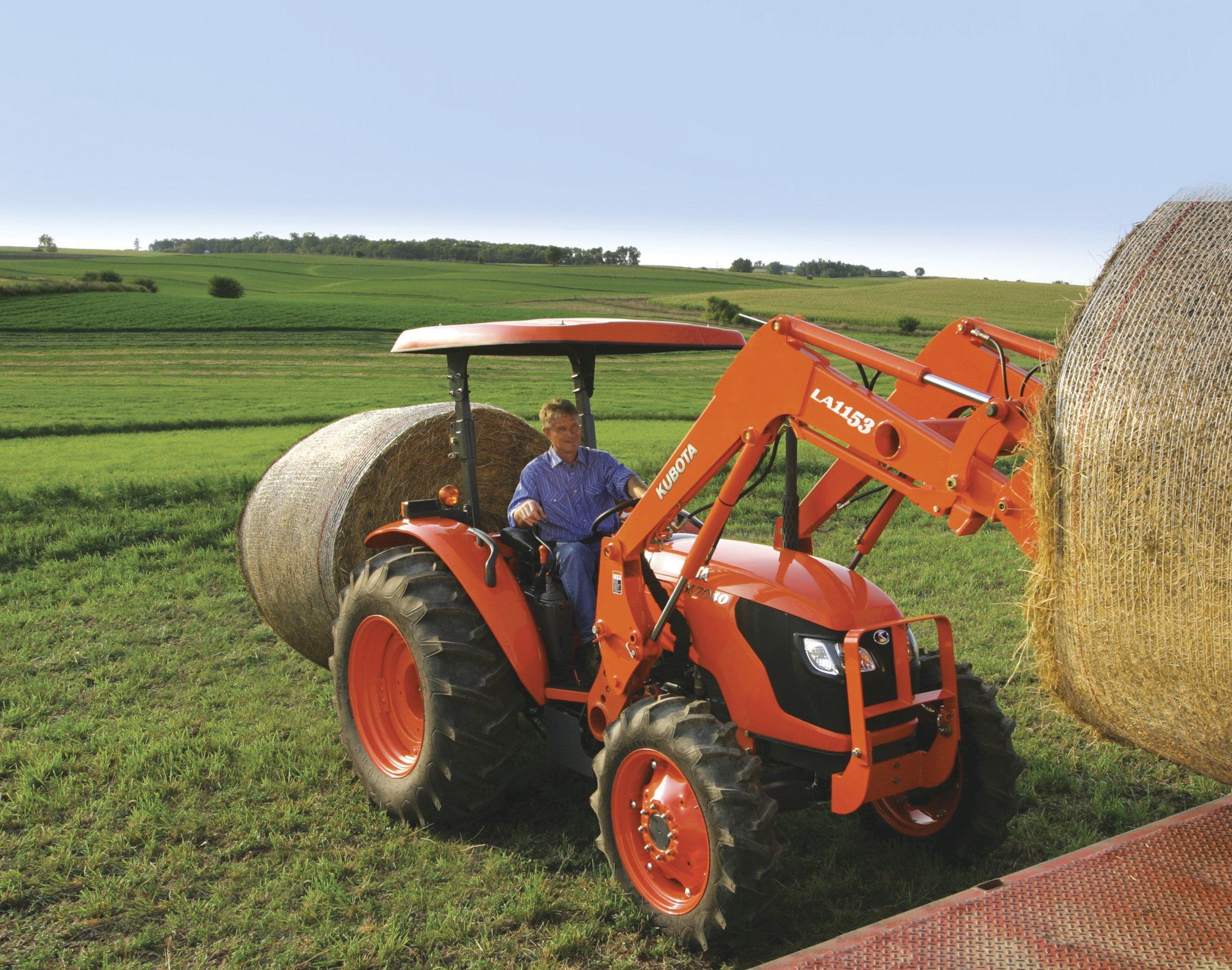 Lawn Mower With Driver Mowing The Grass— Machinery Sells In Dorrigo, NSW