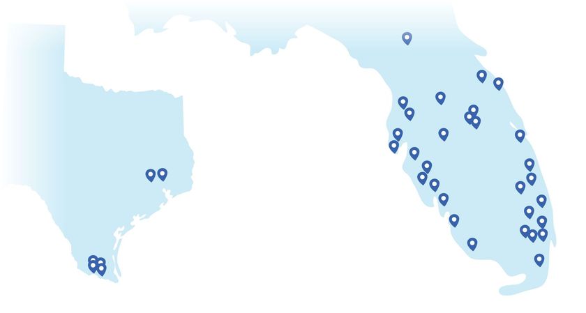 A blue and white map of the united states with pins on it.