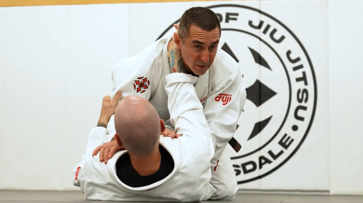 Students practicing throws and grappling at Champion Martial Arts & Fitness in Pasadena, TX.