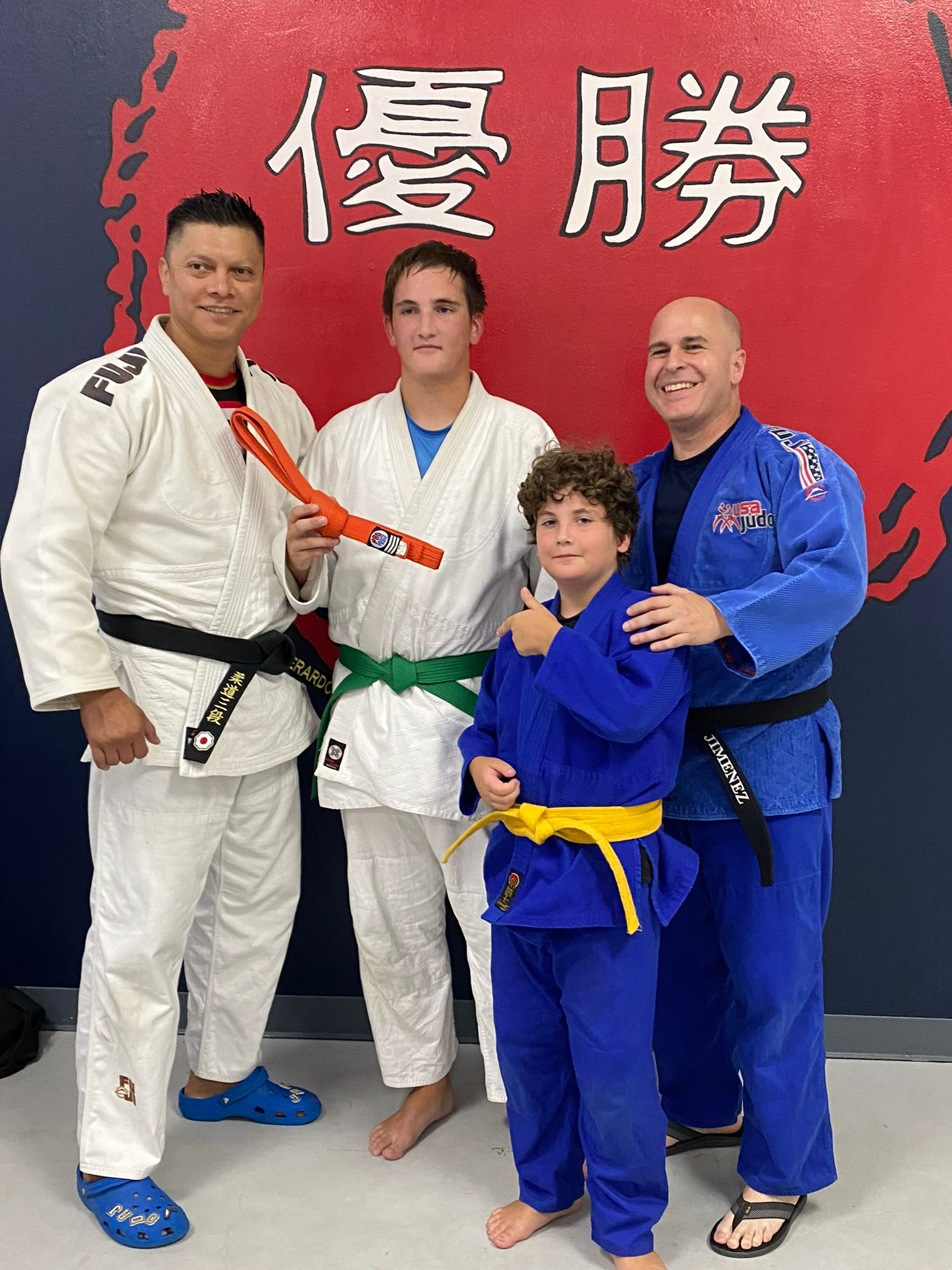Students practice Judo throws at Champion Martial Arts & Fitness in Pasadena, TX, building strength.