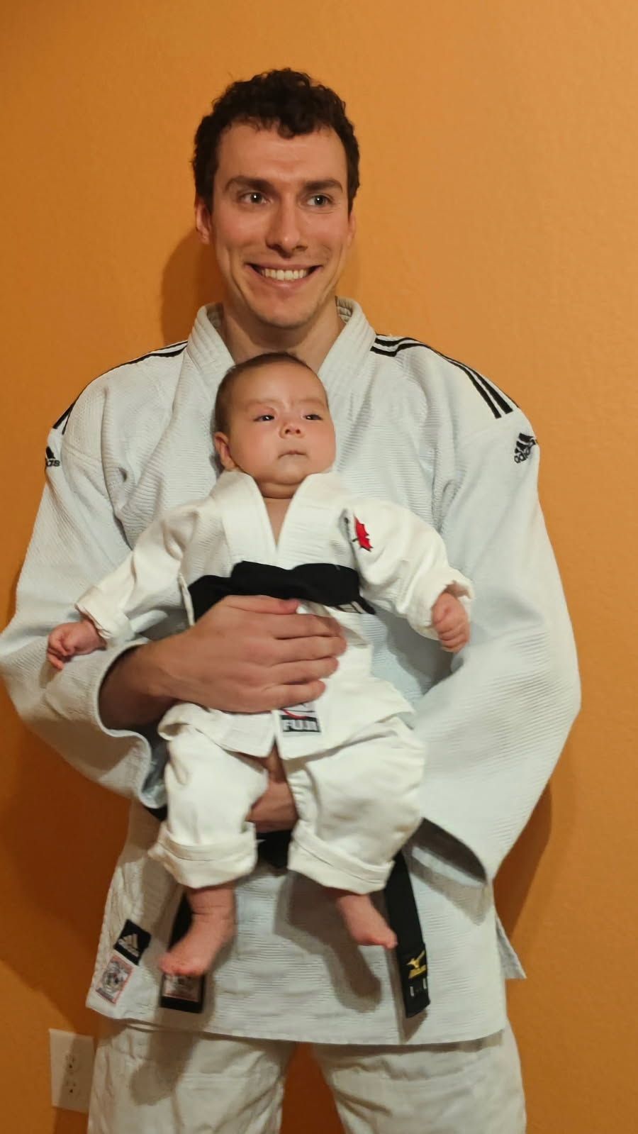 Family practicing Judo throws and safe falls at Champion Martial Arts & Fitness in Pasadena, TX for confidence