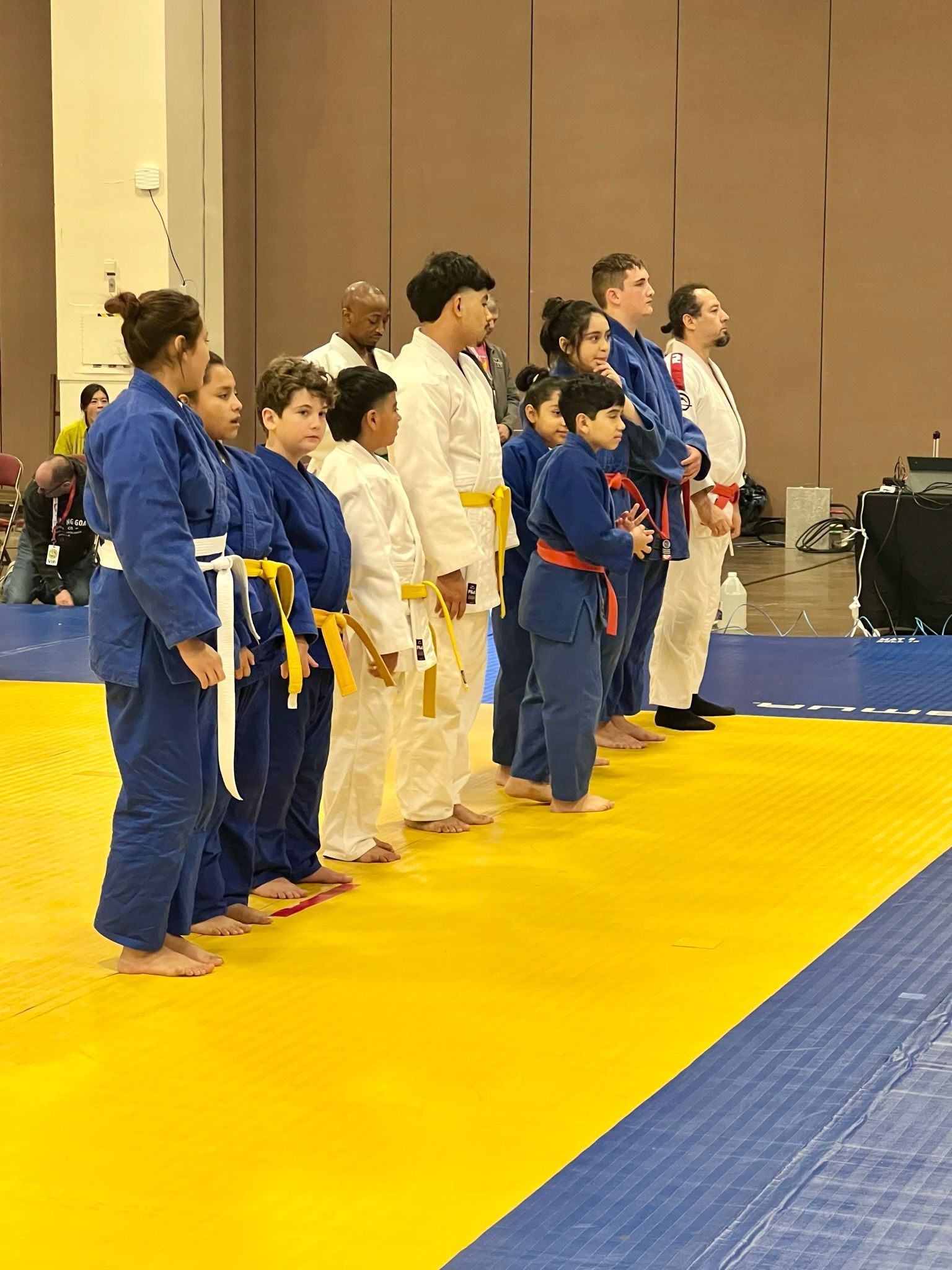 Kids and adults practice Judo throws at Champion Martial Arts & Fitness in Pasadena, Texas, building confidence.