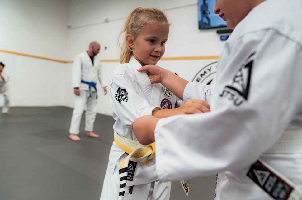 Family practicing Judo drills at Champion Martial Arts & Fitness in Pasadena, TX, building fitness,