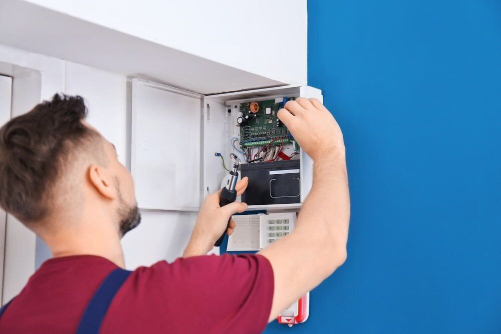 Professional Electrician Conducting Voltage Inspection — Premium Electrical Solutions in Bundaberg, QLD