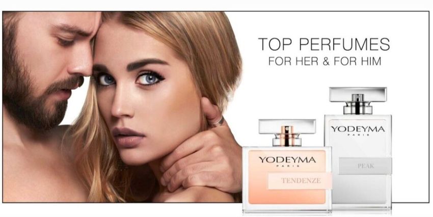 Parfumreclame met twee parfumflesjes en een close-up van een stel, tekst: 
