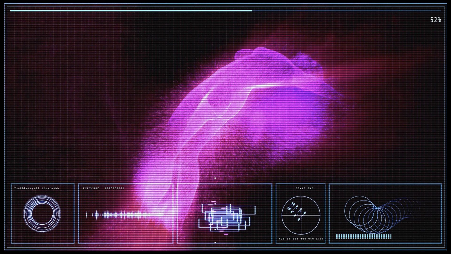 A computer screen shows a purple glowing object