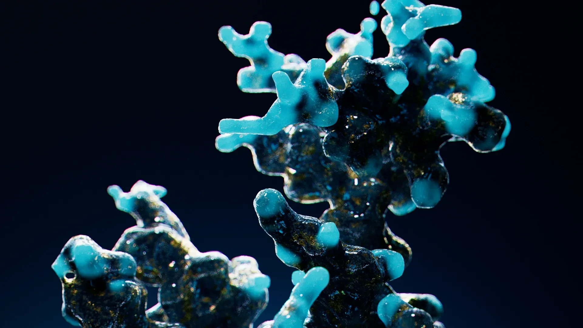 Blue coral-like cluster on a dark background, with bright turquoise branches and textured dark centers