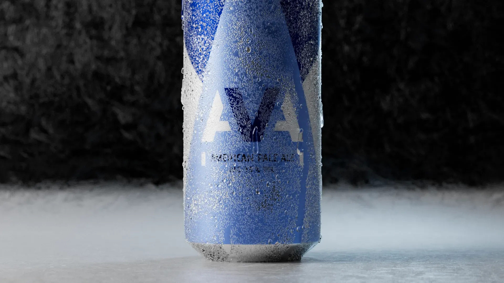 Blue beverage can with condensation over it