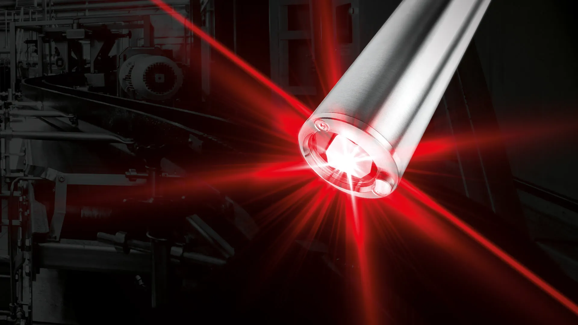 A laser shines from a videojet product marking head.