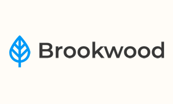 Brookwood logo with a blue leaf icon and dark gray text on a light background
