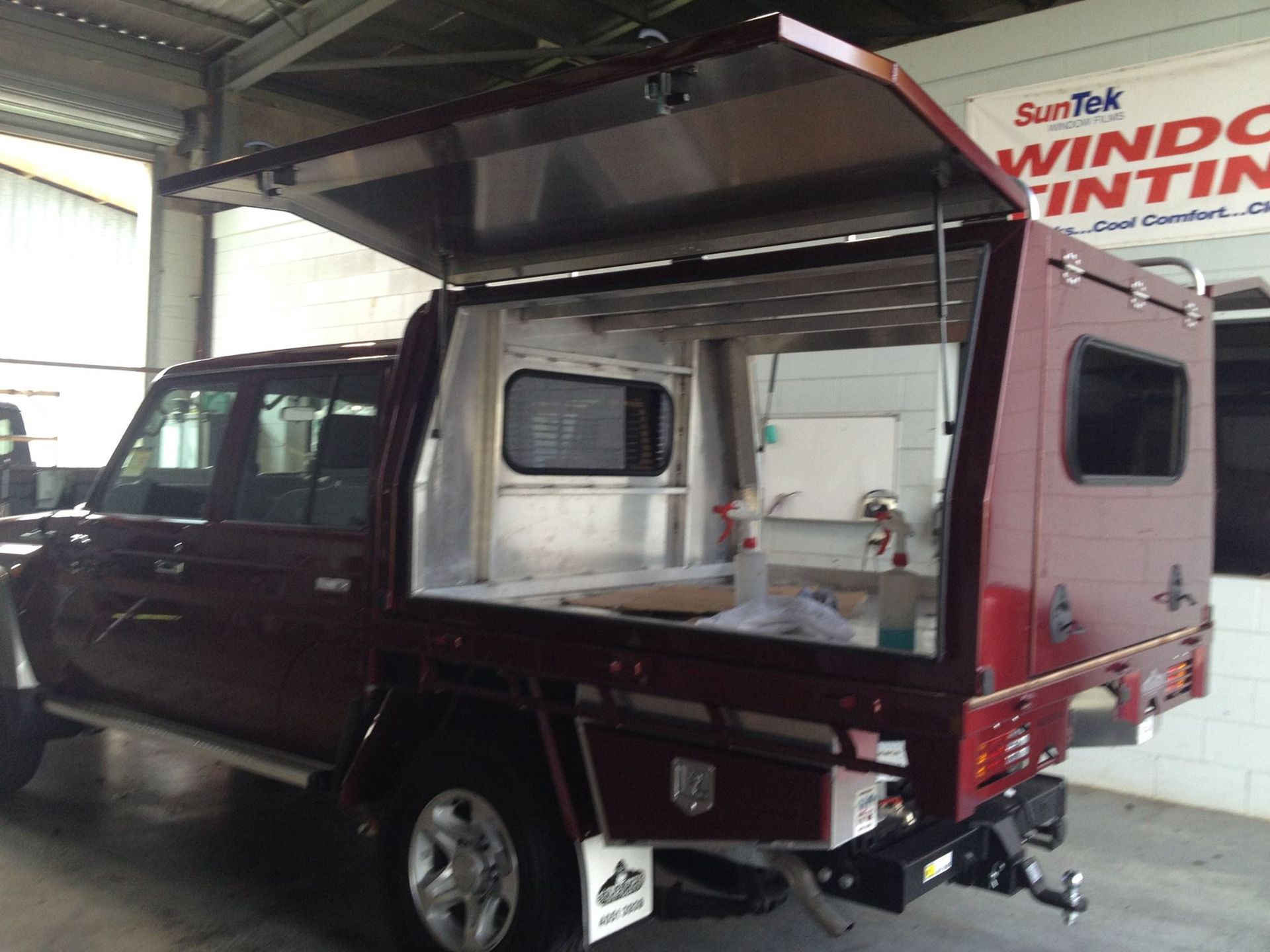 Burgundy Pickup Truck With a Custom Canopy — Mobile Windscreens FNQ in Mission Beach, QLD
