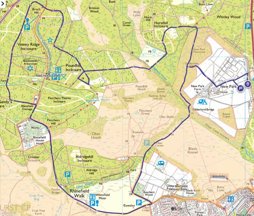 Map of a walking route through a forested area, with a blue path highlighting the trail.