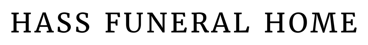 Hass Funeral Home sign in black serif text on a light background