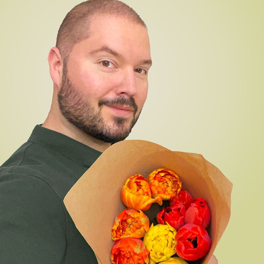 Peter with a bouquet of tulips