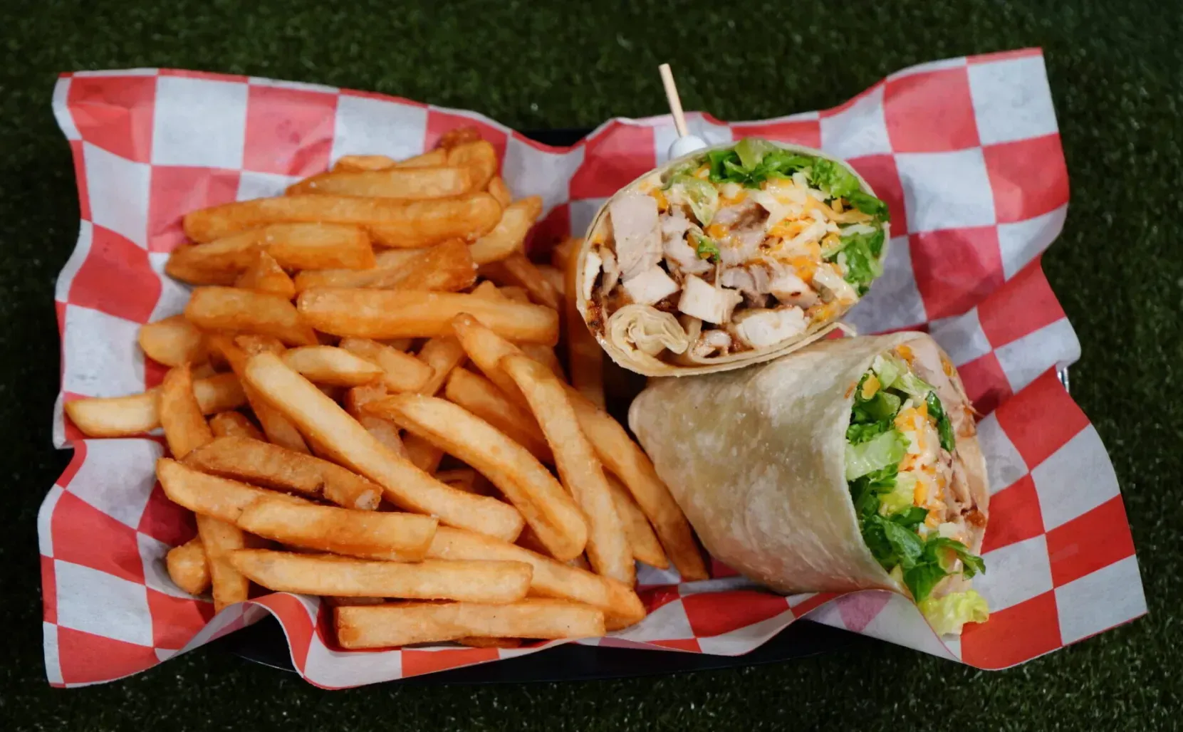 Wrap and fries in red-and-white tray liner