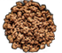 Cooked ground meat, brown, on a black surface.