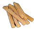 Pile of golden-brown churro pastries on a black surface.