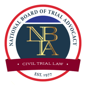 A circular logo for the National Board of Trial Advocacy, featuring "NBTA" in gold over dark blue, labeled "Civil Trial Law."