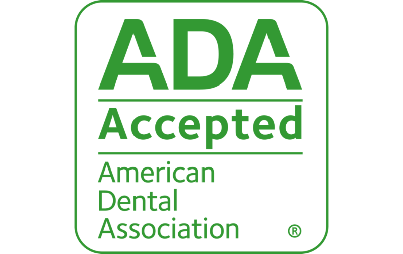 ADA Accepted American Dental Association logo in green and white