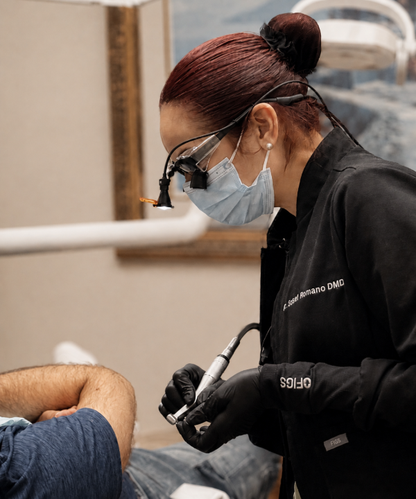 Dr. Romano operating on patient - Romano Smile
