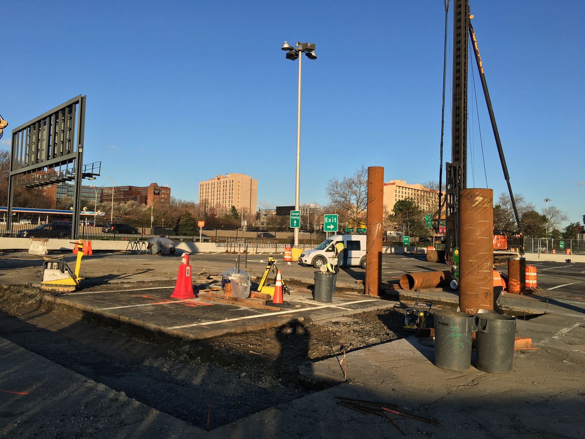 Steel pile casings and a foundation rig at a LaGuardia Airport construction work area.