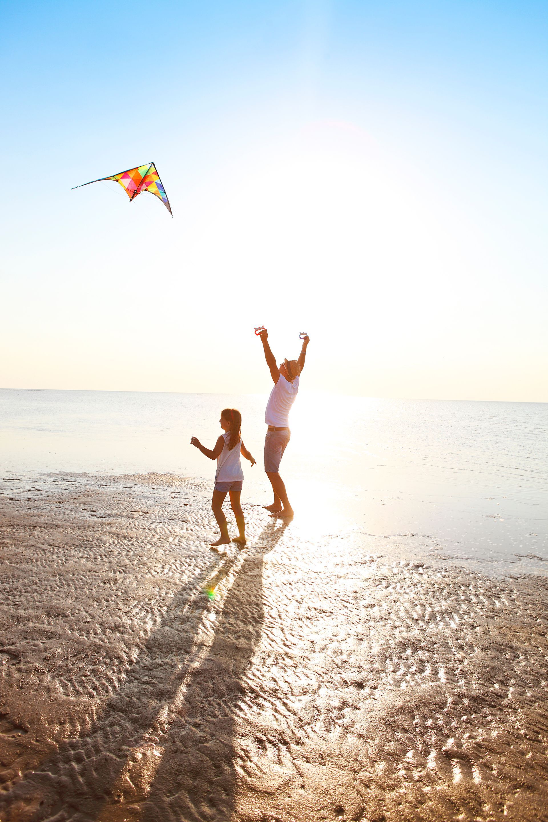 Flying a kite on the beach