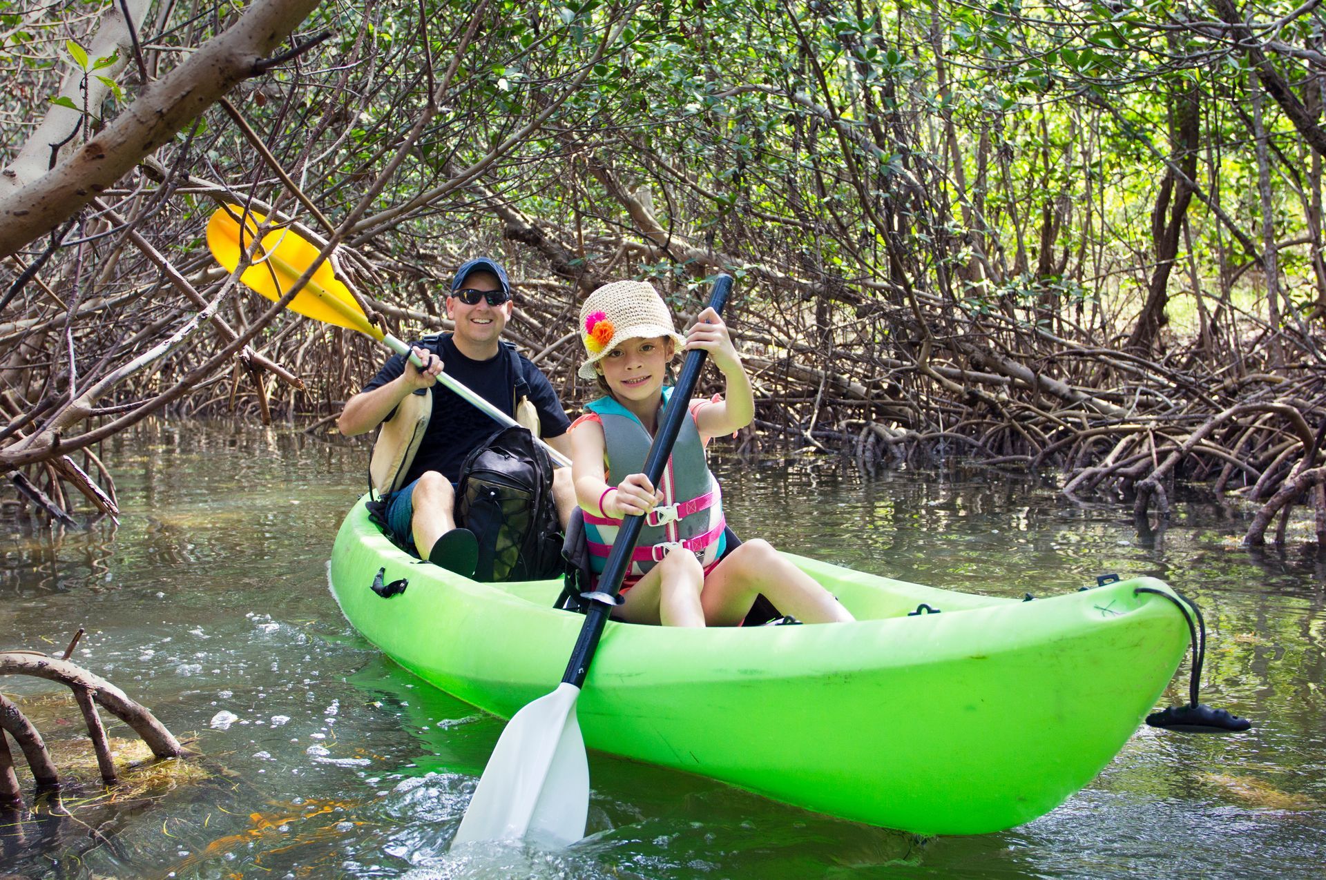 Dad and son canoeing