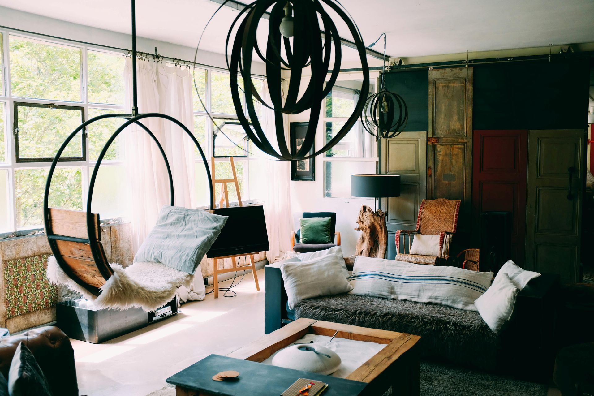 A living room with a couch and a flat screen tv.