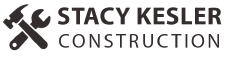 A black and white logo for Stacy Kesler Construction with a hammer and wrench.